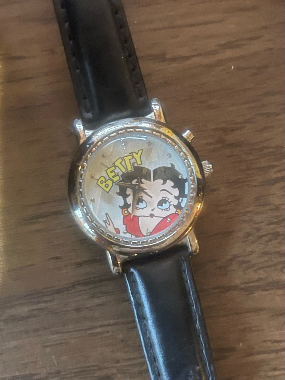 Betty Boop Watch in Black with Red and Yellow Dial Accents. Good condition.